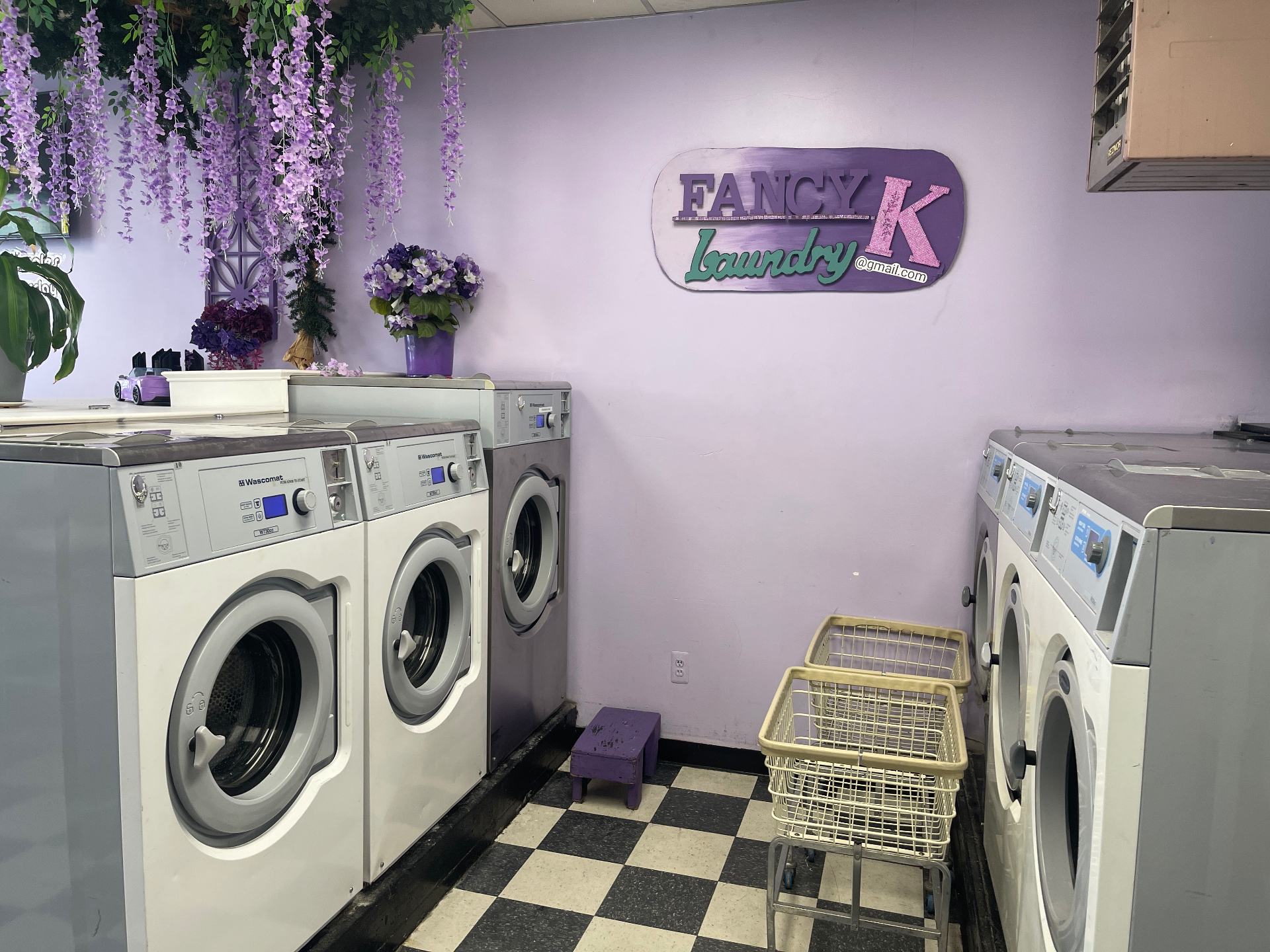 Fancy K Laundry interior with lavender walls and wisteria